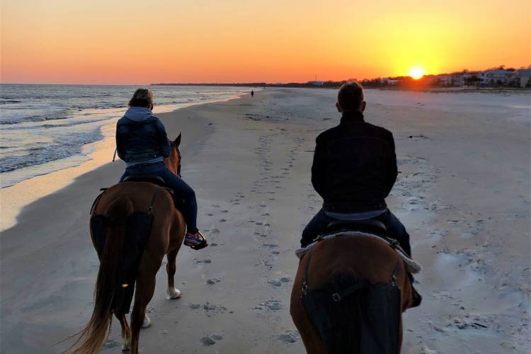 Horseback riding on the beach in Cape San Blas